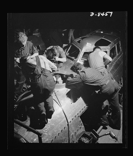 Production. B-17 heavy bomber. Fast, expert workers at the Boeing plant in Seattle apply outer "skins" to fuselage sections for new B-17F (Flying Fortress) bombers, while assembly and fitting operations go forward in the interiors. The Flying Fortress has performed with great credit in the South Pac