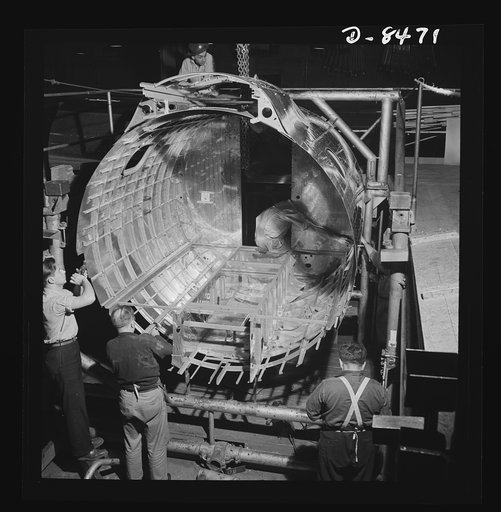Production. B-17 heavy bomber. Completing the framework of a fuselage section for a new B-17F (Flying Fortress) bomber. The Flying Fortress has performed with great credit in the South Pacific, over Germany and elsewhere. It is a four-engine heavy bomber capable of flying at high altitudes