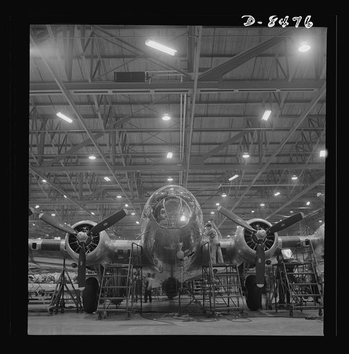 Production. B-17 heavy bomber. A nearly complete B-17F (Flying Fortress) bomber at the Boeing's production line in the Seattle plant. The Flying Fortress has performed with great credit in the South Pacific, over Germany and elsewhere. It is a four-engine heavy bomber capable of flying at high altit