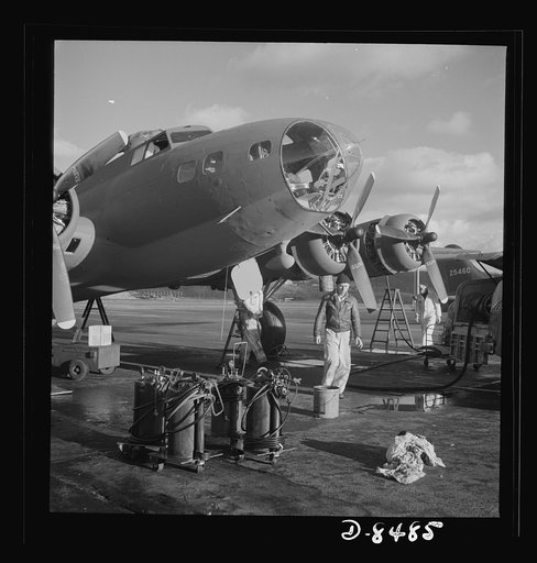 Production. B-17 heavy bomber. Lubricating and servicing a new B-17F (Flying Fortress) bomber for flight tests at the airfield of Boeing's Seattle plant. Ships are delivered to the Army and the Navy after they have successfully undergone flight tests. The Flying Fortress has performed with great cre