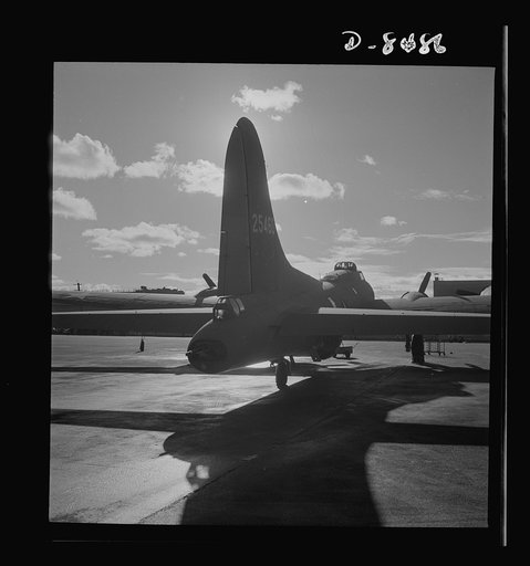 Production. B-17 heavy bomber. Tail view of a new B-17F (Flying Fortress) bomber ready for flight tests at the airfield of Boeing's Seattle plant. The Flying Fortress has performed with great credit in the South Pacific, over Germany and elsewhere. It is a four-engine heavy bomber capable of flying 