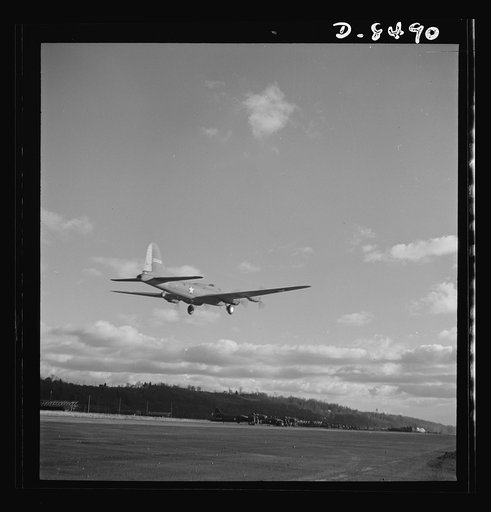 Production. B-17 heavy bomber. Another mighty B-17F (Flying Fortress) bomber sets out on a test flight from the airfield of Boeing's Seattle plant. The Flying Fortress has performed with great credit in the South Pacific, over Germany and elsewhere. It is a four-engine heavy bomber capable of flying