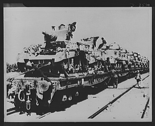 New American tanks leaving for the desert. Large numbers of American light and medium tanks that have arrived in the Middle East are being sent on to the desert by train