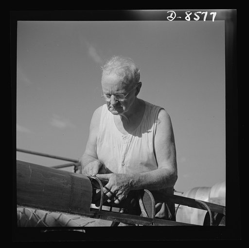 Conversion. Rowing shells to life rafts. Before conversion to war production, the New England plant employing this veteran craftsman built rowing shells for varsity crews. The plant now produces life rafts for the Navy