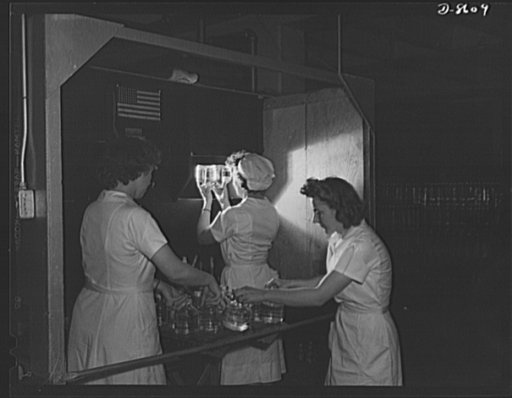 Production. Blood transfusion bottles. Transfusion bottles containing intravenous solution, are given another inspection after being taken from the sterilizer. Women workers are taking over important jobs at Baxter Laboratories, Glenview, Illinois, where plasma containers are prepared for blood bank