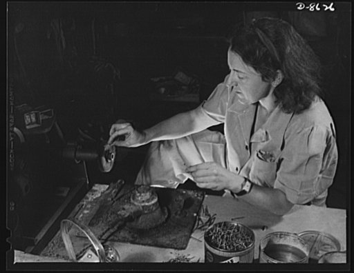 Production. Blood transfusion bottles. Formerly a sculptress and designer of tiles, Dorothy Cole converted her basement into a workshop of tin plate needles for valves for blood transfusion bottles prepared by Baxter Laboratories, Glenview, Illinois, where she lives. She turns in her profits to war 