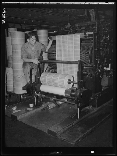 Printing war ration book 2. Printing coupons for war ration book 2. Pressman Adolph Beyer watches as the coupons roll from the press in a steady stream at a printing establishment in Hoboken, New Jersey