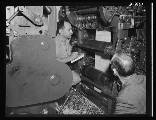 Printing war ration book 2. Covers for war ration book 2 roll from the press at a plant in Hoboken, New Jersey. The press is stopped as the ration book's serial number is checked