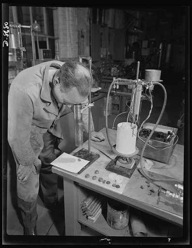 Science and research. Studies of non-coking coals. V.F. Parry, supervising engineer of the Golden, Colorado field station of the U.S. Bureau of Mines is "sighting a coke bubble." This procedure is used to determine if a given coke has changed its properties or it is similar to another coke. One gram