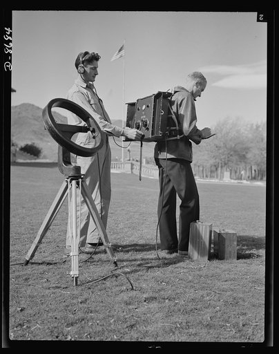 Science and research. Mineral prospecting. A ground comparator will reveal the presence of an ore body under the surface of the earth by measuring the total intensity and the plane of polarization of the secondary electro-magnetic field set up by the ore body. These students are using an adjustable 