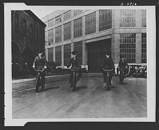 Navy yard, Brooklyn, New York. Marine messengers on their daily tour of the yard with important orders for various commanders