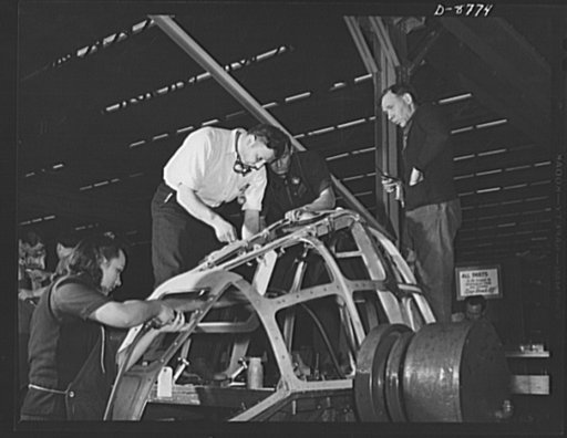 Production. B-24E (Liberator) bombers at Willow Run. Assembling the frame of a nose for a B-24E (Liberator) bomber in Ford's big Willow Run plant. The Liberator is capable of operation at high altitudes and over great ranges on precision bombing missions. It has proved itself an excellent performer 