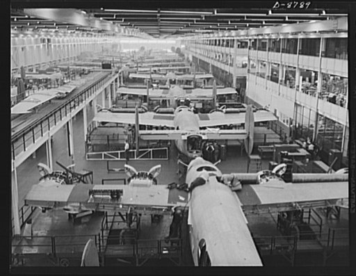 Production. B-24E (Liberator) bombers at Willow Run. Looking down one of the two final assembly lines for B-24E (Liberator) bombers at Ford's big Willow Run plant. Guns and wing tips have not yet been added to the planes in the foreground. The Liberator is capable of operation at high altitudes and 