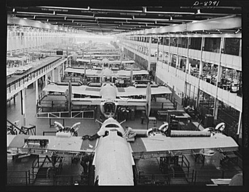 Production. B-24E (Liberator) bombers at Willow Run. Looking down one of the two final assembly lines for B-24E (Liberator) bombers at Ford's big Willow Run plant. Guns and wing tips have not yet been added to the planes in the foreground. The Liberator is capable of operation at high altitudes and 