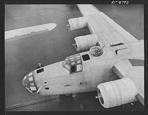 Production. B-24E (Liberator) bombers at Willow Run. Another B-24E (Liberator) bomber nears completion on one of the assembly lines at Ford's big Willow Run plant. A paint job comes next. The Liberator is capable of operation at high altitudes and over great ranges on precision bombing missions. It 