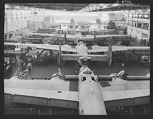 Production. B-24E (Liberator) bombers at Willow Run. New Liberator (B-24E) bombers, nearly completed and ready to roll off one of the assembly lines at Ford's big Willow Run plant. The Liberator is capable of operation at high altitudes and over great ranges on precision bombing missions. It has pro