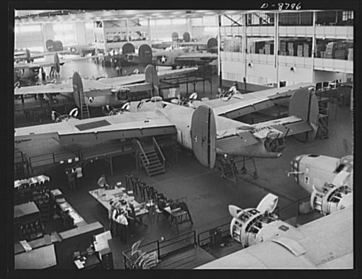 Production. B-24E (Liberator) bombers at Willow Run. New Liberator (B-24E) bombers, nearly completed and ready to roll off one of the assembly lines at Ford's big Willow Run plant. The Liberator is capable of operation at high altitudes and over great ranges on precision bombing missions. It has pro