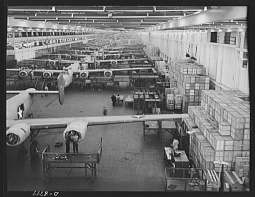 Production. B-24E (Liberator) bombers at Willow Run. Looking up one of the assembly lines at Ford's big Willow Run plant, where B-24E (Liberator) bombers are being made in great numbers. The Liberator is capable of operation at high altitudes and over great ranges on precision bombing missions. It h