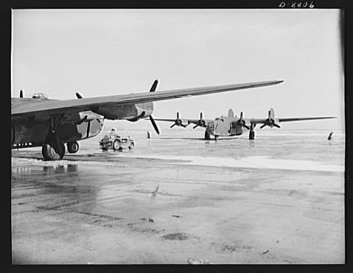 Production. B-24E (Liberator) bombers at Willow Run. New B-24E (Liberator) bombers just completed at Ford's big Willow Run plant, have been rolled from the hangars for test flights. The Liberator is capable of operation at high altitudes and over great ranges on precision bombing missions. It has pr