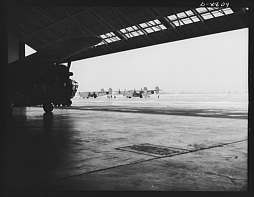 Production. B-24E (Liberator) bombers at Willow Run. New B-24E (Liberator) bombers just completed at Ford's big Willow Run plant, have been rolled from the hangars for test flights. The Liberator is capable of operation at high altitudes and over great ranges on precision bombing missions. It has pr