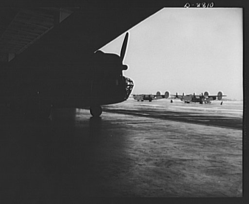 Production. B-24E (Liberator) bombers at Willow Run. New B-24E (Liberator) bombers just completed at Ford's big Willow Run plant, have been rolled from the hangars for test flights. The Liberator is capable of operation at high altitudes and over great ranges on precision bombing missions. It has pr