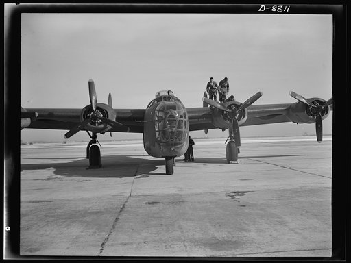 Production. B-24E (Liberator) bombers at Willow Run. A new B-24E (Liberator) bomber, just off the assembly line at Ford's big Willow Run plant, gets a last-minute inspection before taking off on its test flights. The Liberator is capable of operation at high altitudes and over great ranges on precis