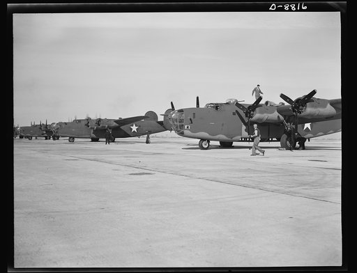 Production. B-24E (Liberator) bombers at Willow Run. New B-24E (Liberator) bombers, just off the assembly lines at Ford's big Willow Run plant, are lined up for test flights before they are accepted by the Army. The Liberator is capable of operation at high altitudes and over great ranges on precisi