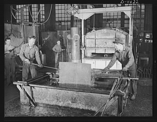 Production. Halftrac armoured cars. Steel sheets from which body parts for halftrac cars will be made are case-hardened in a large Eastern plant converted from the manufacture of locks and safes. Diebold Safe and Lock Company, Canton, Ohio