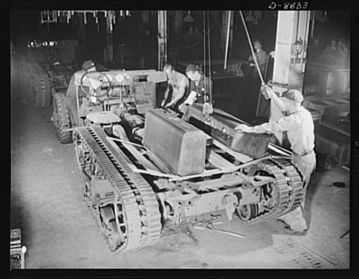 Production. Halftrac armoured cars. Preparing to install non-leaking gasoline tanks on the chassis of a halftrac scout car. The Eastern plant in which the body is made and installed formerly produced locks and safes. Diebold Safe and Lock Company, Canton, Ohio