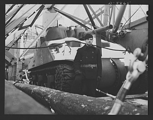 Transportation. Lend-lease shipments. An American M-4 tank, stowed and under guard, on the deck of a United Nations freighter that will carry it, as part of a lend-lease shipment, together with food and other war necessities, to one of our allies