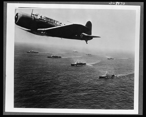 Convoy. A scout plane from the aircraft carrier USS Ranger returns from a patrol flight of the area of the sea through which a convoy is passing. The efficient work of planes like this accounts in large measure for the relatively few ships that are successfully attacked by submarine wolf packs
