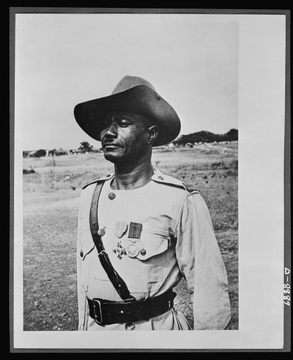 Member of the Order of the British Empire. Decorated for continuous gallantry and devotion to duty while under fire in the East African campaign, Regimental Sergeant Major LIanyier Dagarti of the Gold Coast Regiment, Royal West African Frontier Force, was the first Gold Coast soldier to receive the 