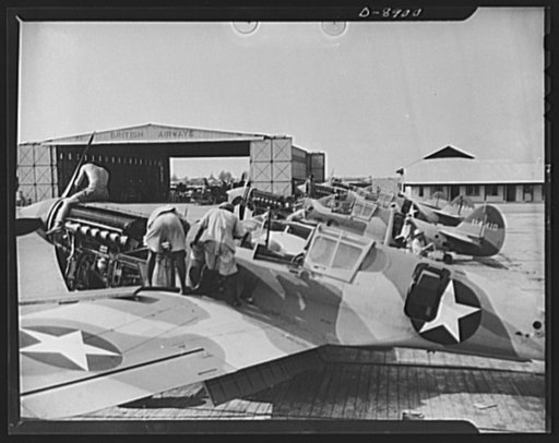 American "steam chickens" arrive in Africa. As rapidly as they are assembled, American P-40 fighter planes line up at an African airport, are fueled and given final adjustments prior to taking off for the battlefront