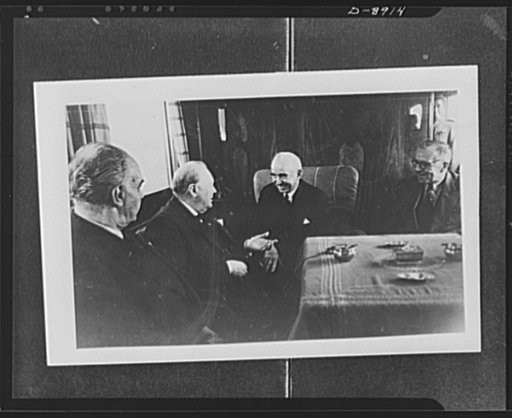 Prime Minister Winston Churchill and president of Turkey. Churchill and Ismet Inonu, president of Turkey, exchange pleasantries on board the presidential train as they met in Adana for conference. Left to right: Marchal Fevsi Cakmak, chief of staff of Turkish army, Churchill, Inonu and Sukru Saracog