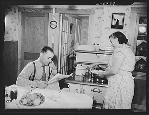 Victory food from American waters. Home again, Captain Riberia [i.e., Ribeiro] waits for his wife to prepare supper. Born in Brazil, brought up in Portugal, he has been a fisherman for twenty-three years. He came to the United States in 1927