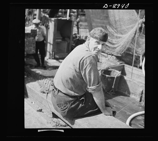 Victory food from American waters. Typical pier hand on docks at Gloucester, Massachusetts. A famous fishing center for centuries, this port now ships thousands of tons of fish to the Army and Navy