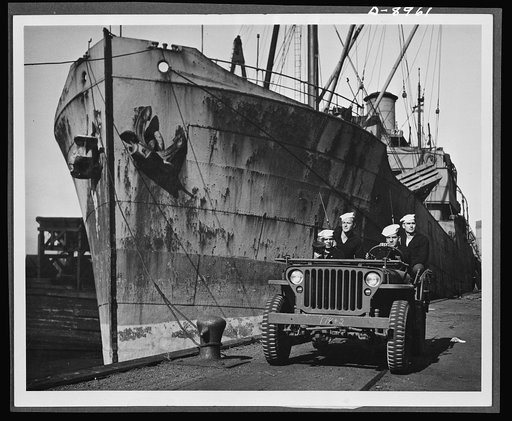 Coast Guard anti-saboteur patrol. Vital cargoes of war supplies for America's far-flung battle lines must also be protected on the docks and piers from enemy attempts at sabotage. The Coast Guard now uses jeeps with armed Coast Guardsmen maintaining vigilant waterfront patrols