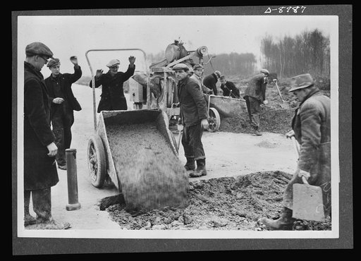 Reciprocal aid. Pouring concrete for runways for an airfield in Britain for the U.S. Army Air Forces. British labor and material is used in the construction of runways, offices, sleeping quarters and all essential services required for an airport. These facilities are supplied to the United States u