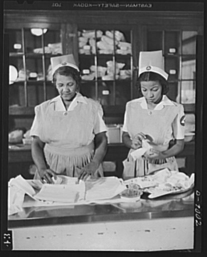 Answering call for volunteer nurses aides. The call for 100,000 volunteer nurses aides to relieve the acute shortage of graduate nurses is answered by Negro housewives and mothers throughout the country. At Freedmen's Hospital in Washington, D.C. where an eighty-hour training courses has been in pro