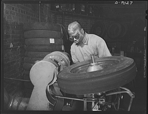 Tire recapping. The tread surface of a used tire is ground evenly to permit application of a reclaimed camelback rubber recap. The plan to recap passenger tires with reclaimed rubber camelback, approved by rubber director William M. Jeffers, was put into effect in February 1943 to reduce the demand 