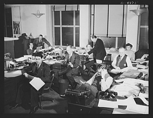 Office of War Information news bureau. These OWI reporters work six days a week on stories for both domestic and overseas use. In the course of a week most of them turn out a list of assignments as long as a cub reporter's. Examples of the variety of stories done: "Roundup on wartime transportation,
