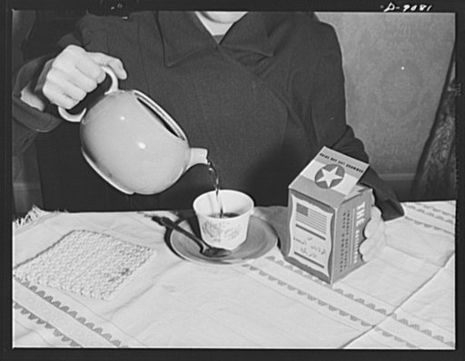 Labels. North Africa, long starved by the Axis, sees the American flag on tea from the United States, 800 tons of it. Six million half-and-quarter-pound flag-stamped packages have been distributed so far. Fourteen million packages of cotton goods, used clothing, condensed and powder milk, sugar, tob