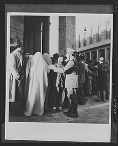 8th Army in Tripoli. Faces of Tripoli's residents as they watch the arrival of the British 8th Army