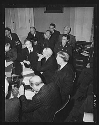 Lend-lease hearings. Secretary of War Henry L. Stimson testifies in support of continuance of the lend-lease Act before the House Foreign Affairs Committee, as Edward R. Stettinius, Jr., lend-lease administrator, looks on