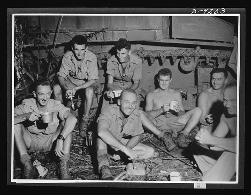 Australia in the war. Australian military police, astride American motorcycles, stage a demonstration for distinguished visitors at a camp in Australia. They have been commended both in authoritative circles and among the troops for their magnificient work in the Middle East campaign