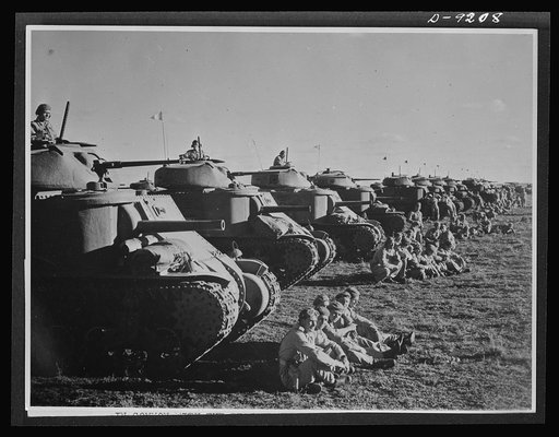 Australia in the war. Australian troops of an armored division enjoy a short rest period during training maneuvers. These American tanks, furnished under lend-lease, are playing an important role in the development of United Nation's mechanized forces