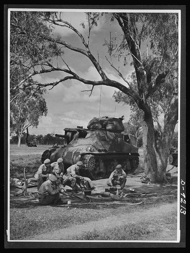 Australia in the war. Months of training under field conditions contribute to the building up of Australia's armored forces. The American tank shown here is part of the fighting equipment furnished United Nations under lend-lease