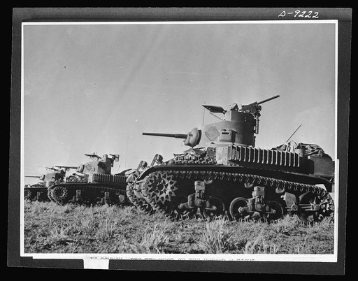 Australia in the war. One member of each Australian tank crew remain continuously on guard during periods of inactivity. These are American tanks furnished under lend-lease
