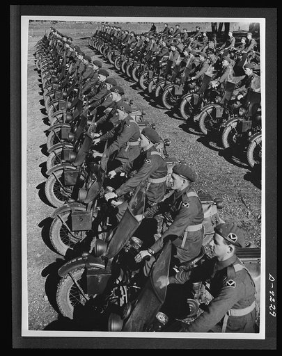 Australia in the war. Dispatch riders of an Australian armored division lined up for review. These are American motorcycles, furnished under the lend-lease program