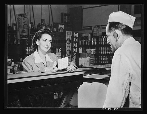 A customer can use the ration books of the whole family. But the first thing she will want to know when she buys pork chops, a pound of butter or a half pound of cheese is--"How many points will it take?"